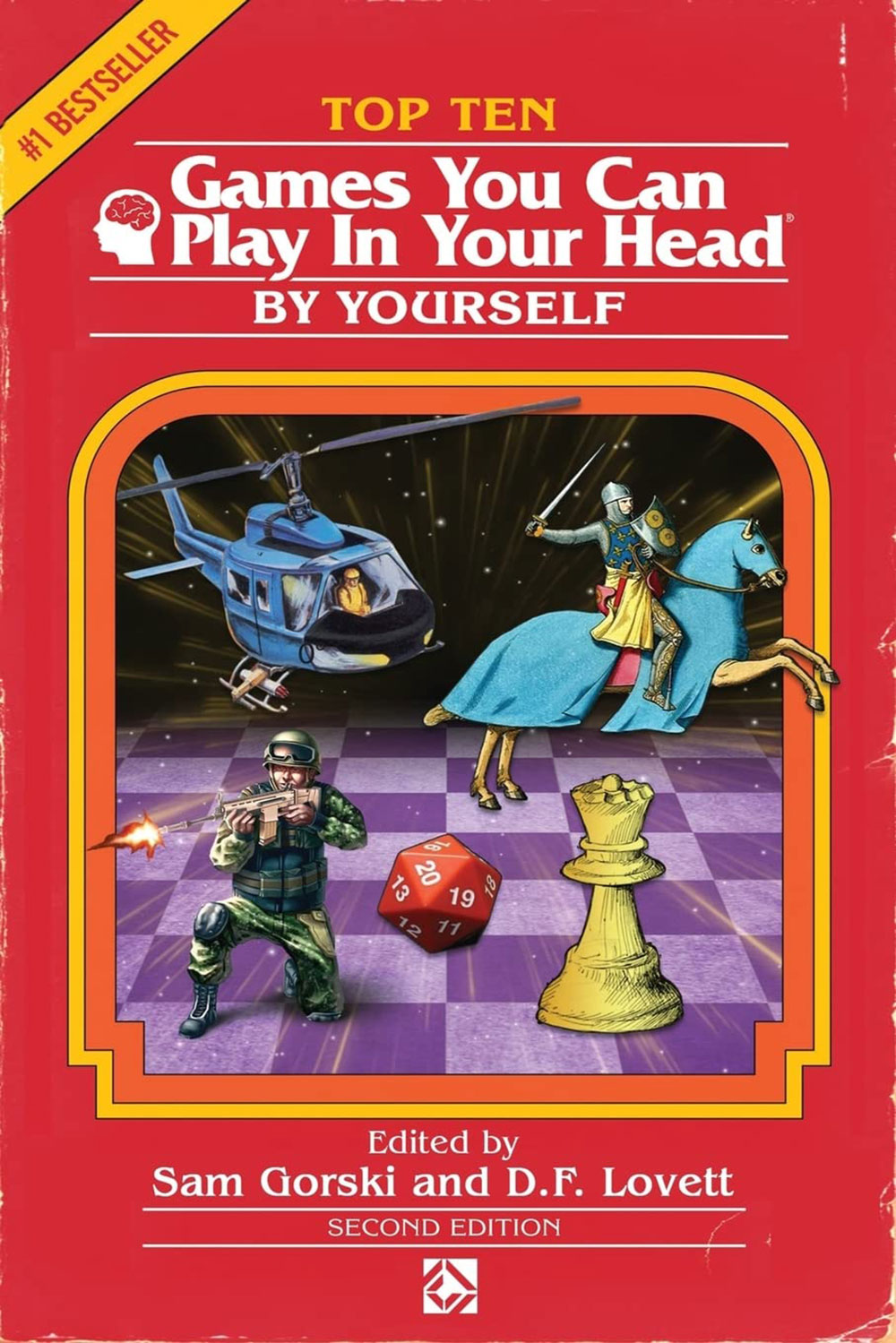 『Top 10 Games You Can Play In Your Head, By Yourself』의 표지 사진. 빨간색 배경의 책 커버 상단에 영제가 쓰여있고, 가운데 노란색과 주황색으로 테두리 지어진 공간에는 체스판을 배경으로 좌측 상단부터 시계방향으로 헬리콥터, 말을 탄 중세 기사, 체스말, 20면체 주사위, 한쪽 무릎을 세워 앉아서 총을 쏘는 군인의 일러스트가 그려져 있다. 일러스트의 하단에는 편집자와 출판사 정보가 적혀있다. 책 표지의 테두리가 약간 닳아 있다. 